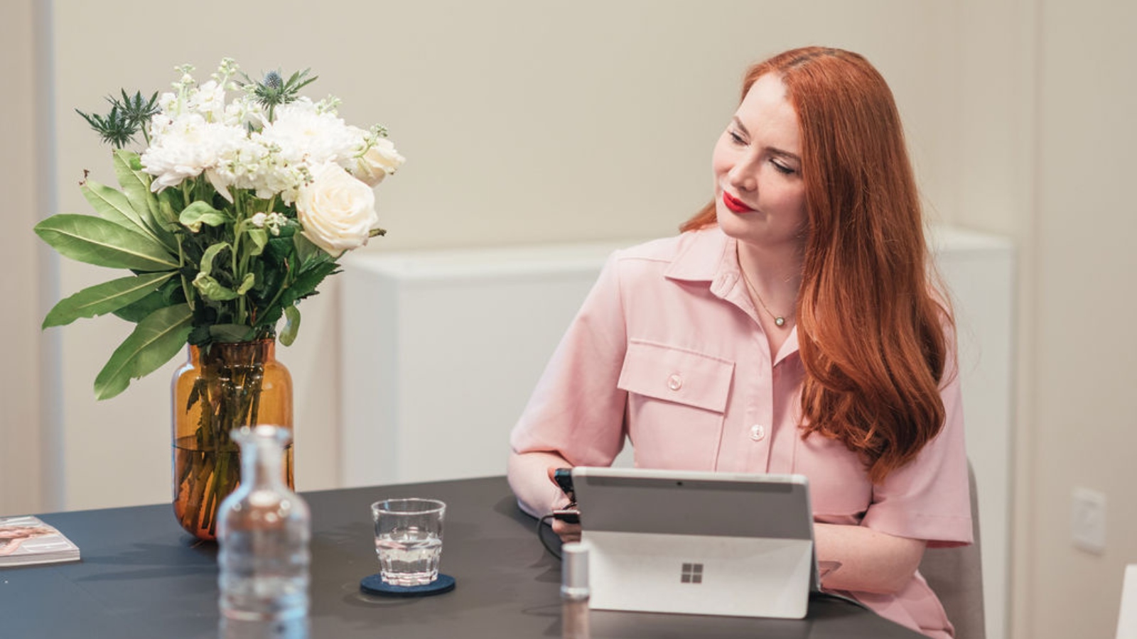 julia kendrick at a desk